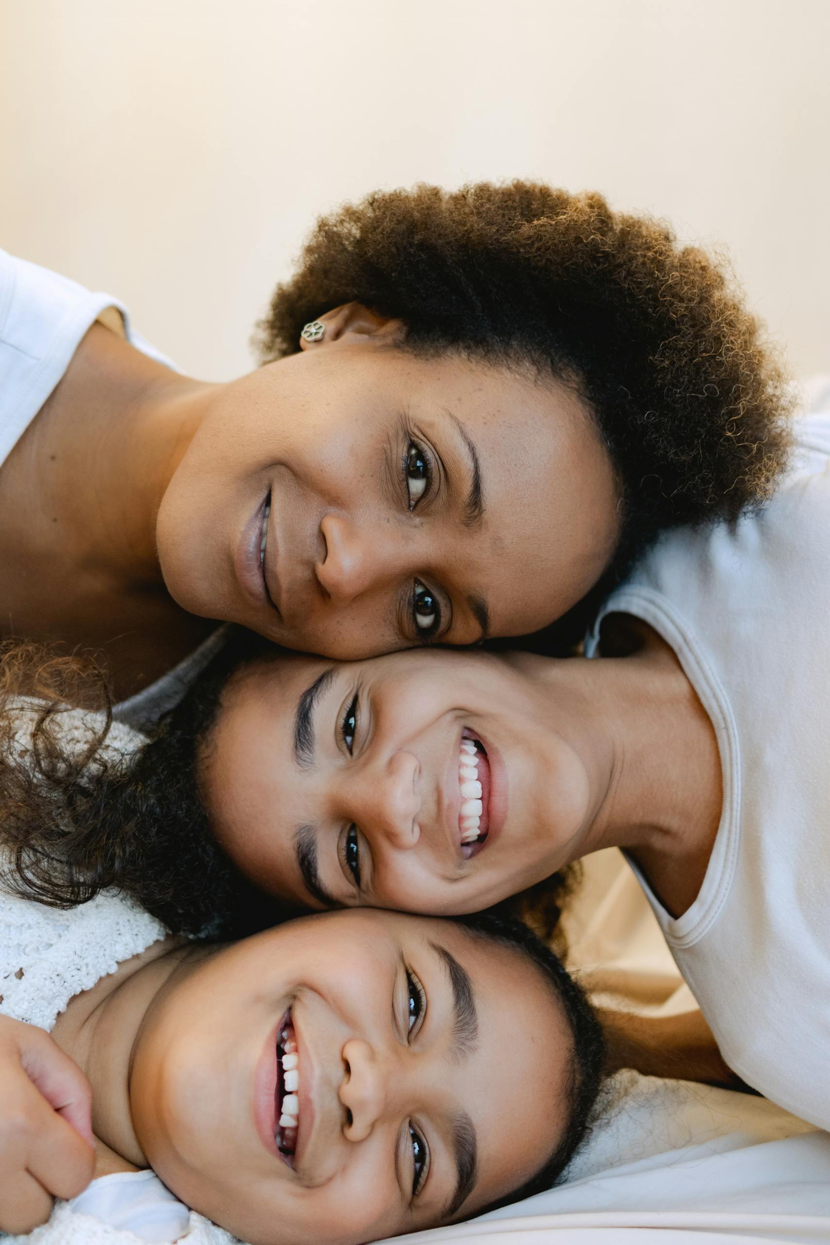 A Family Smiling at the Camera